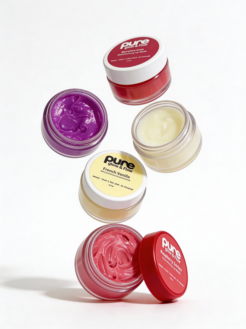 Five jars of Pure & Pure lip butter in different flavors on a white background
